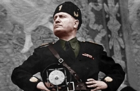 Image of Benito Mussolini mugging to the camera
